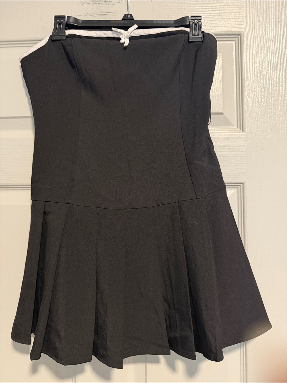 Strapless Black Fit-and-Flare Romper with Pleated Skirt